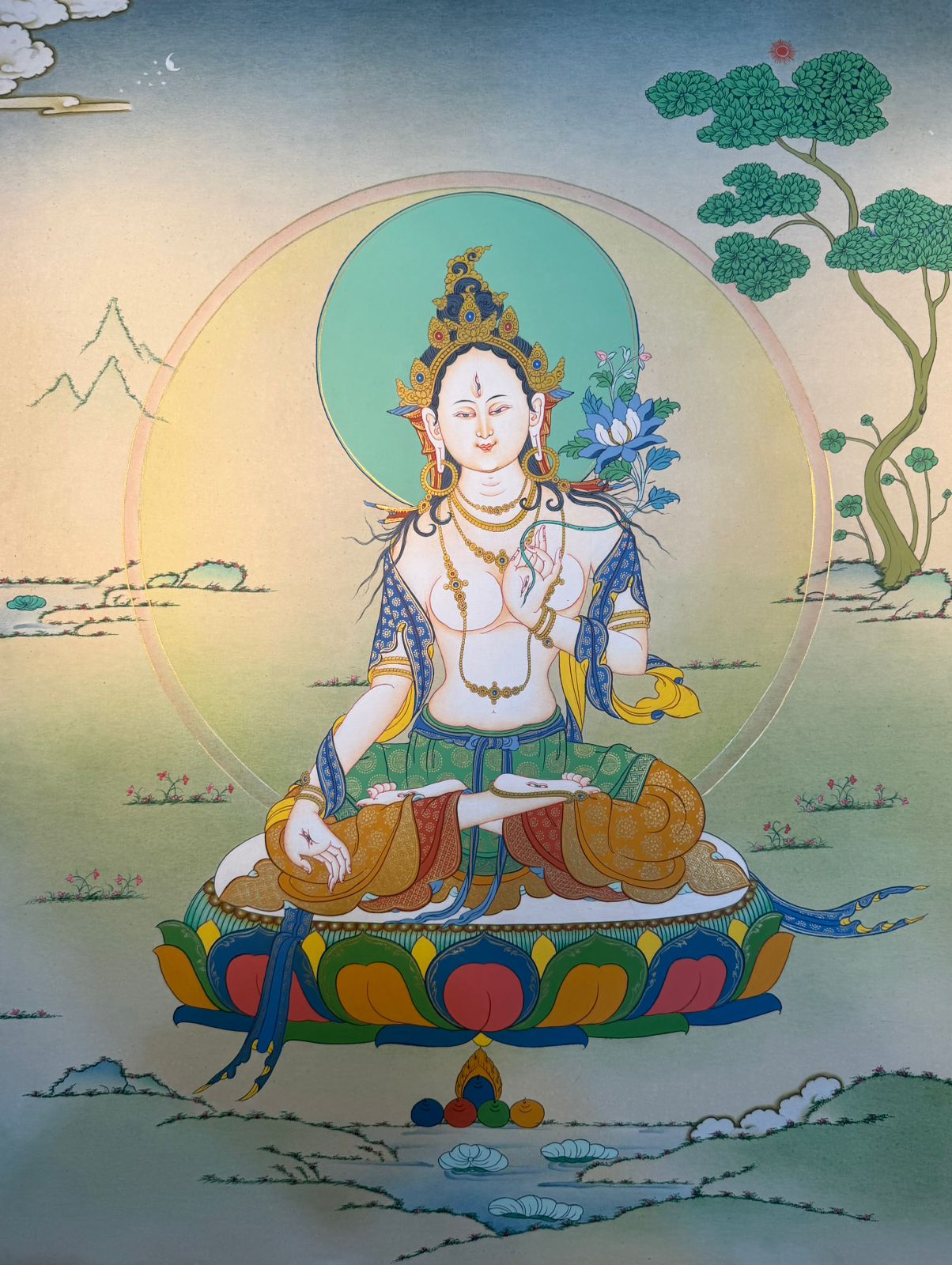 Thangka painting of a seated goddess with ornate crown, circular halo, and blue details