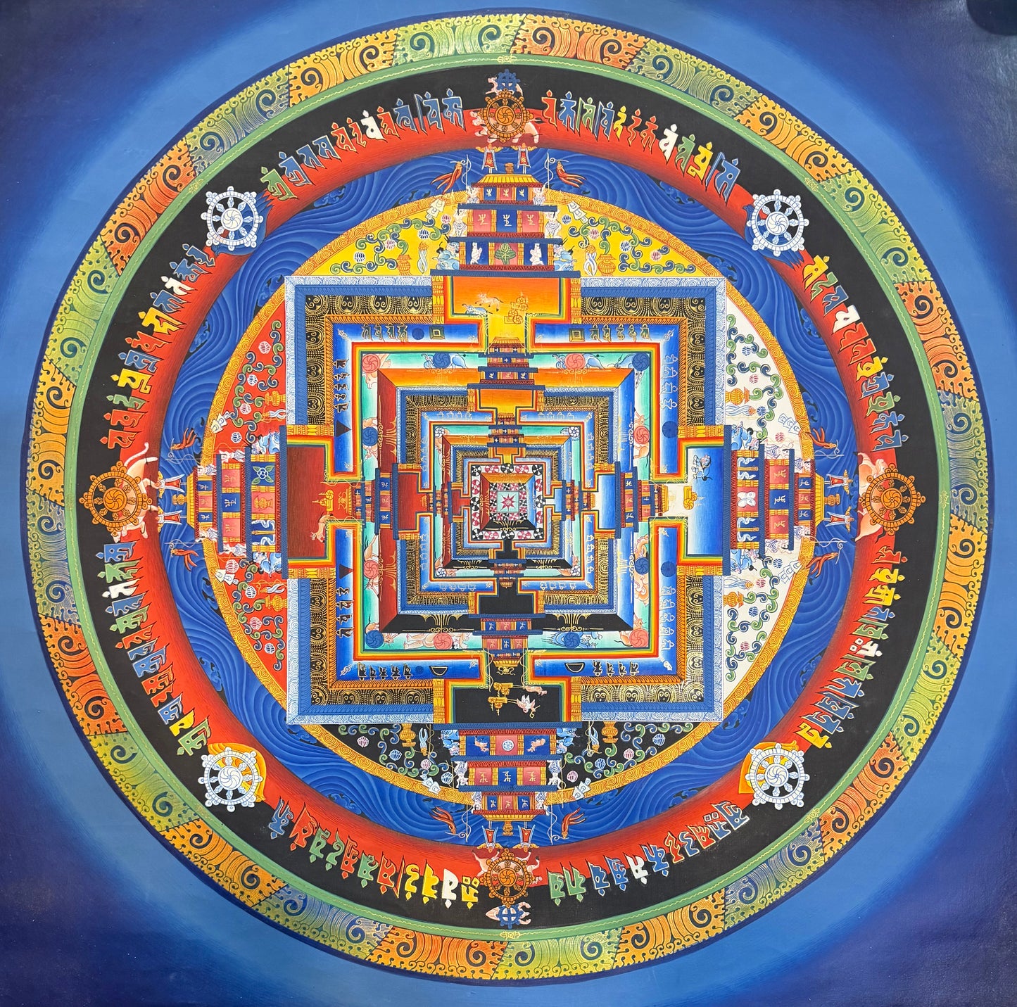 Kalachakra mandala thangka painting with ornate circular geometric design and central square