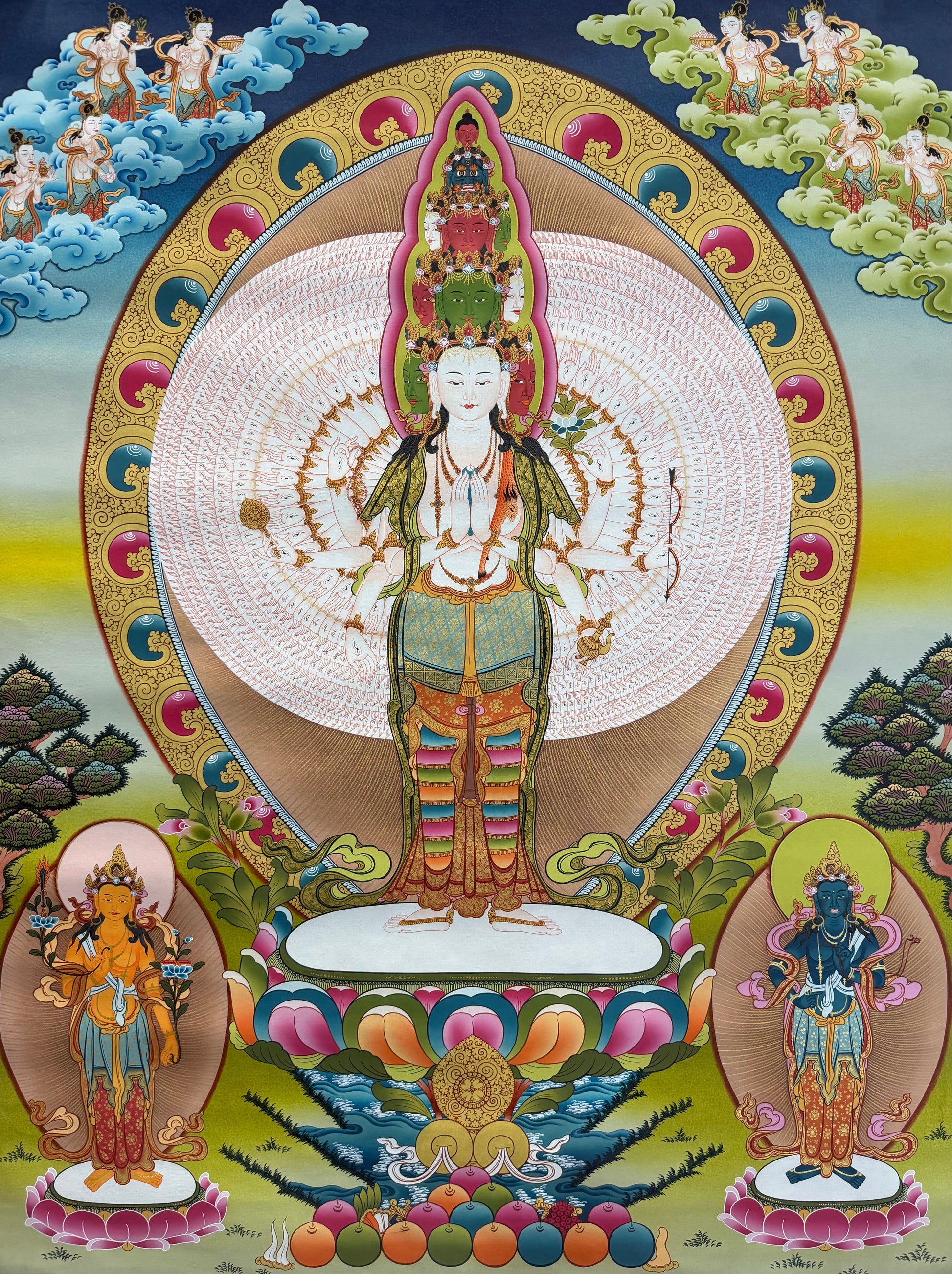 Seated white-faced Avalokiteshvara thangka with pink-gold halo, lotus base, two side figures
