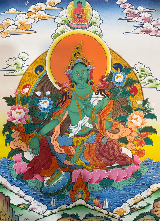 Green Tara thangka painting with seated goddess in ornate halo and lotus flowers