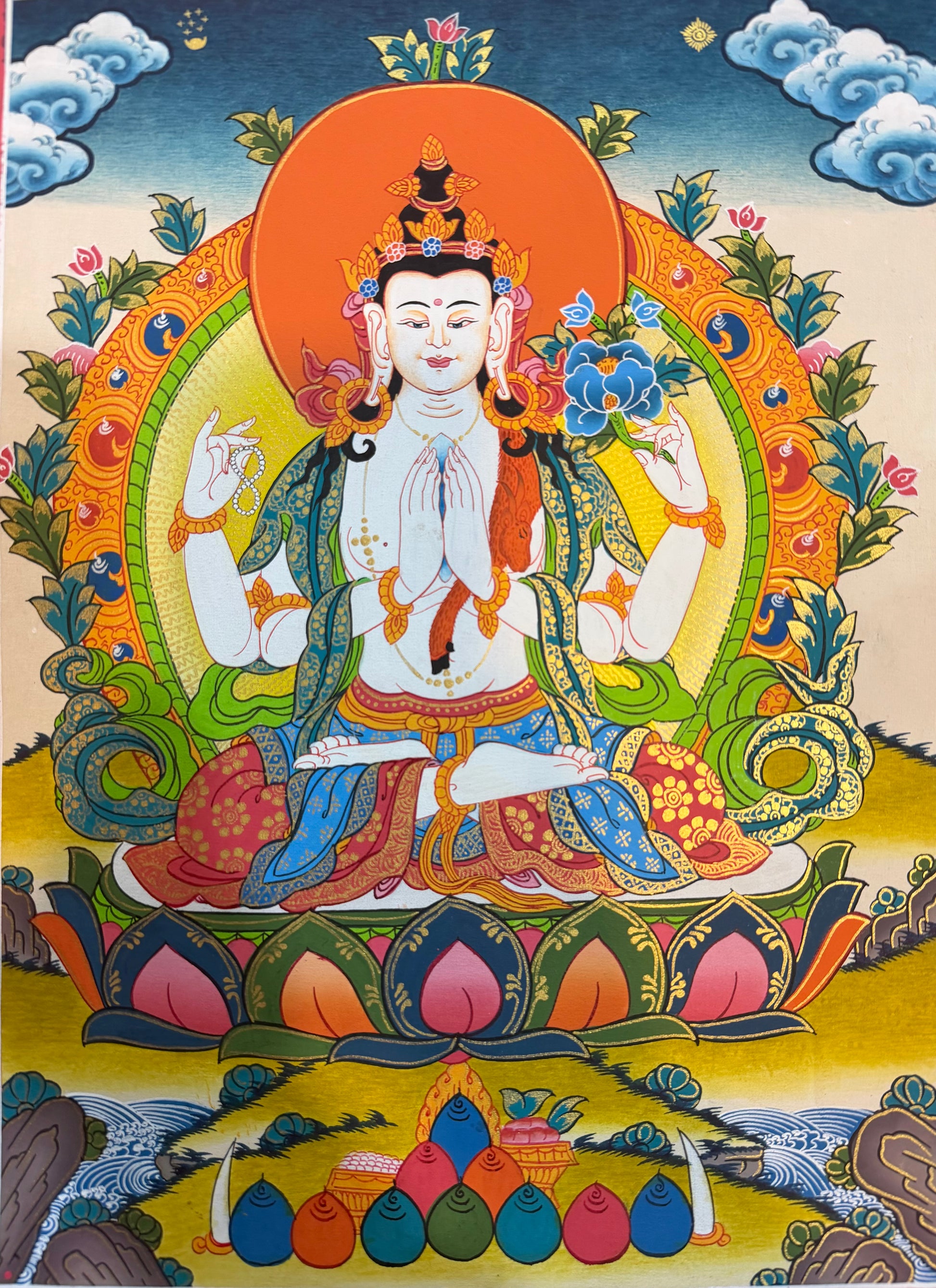 Chenrezig thangka painting of seated white-faced deity with orange halo, lotus seat, clouds