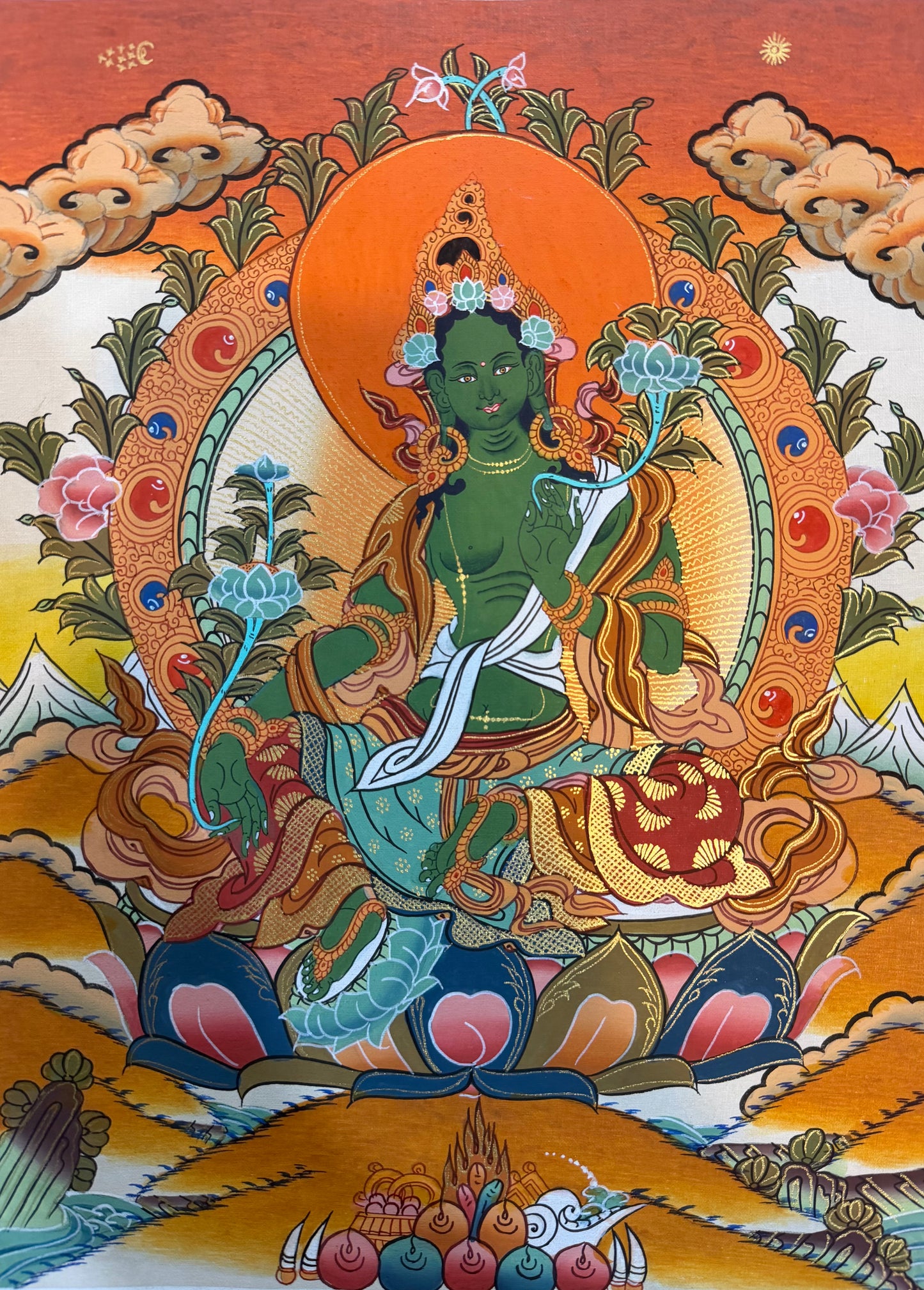Green Tara thangka painting with seated green goddess, orange halo, ornate lotus base