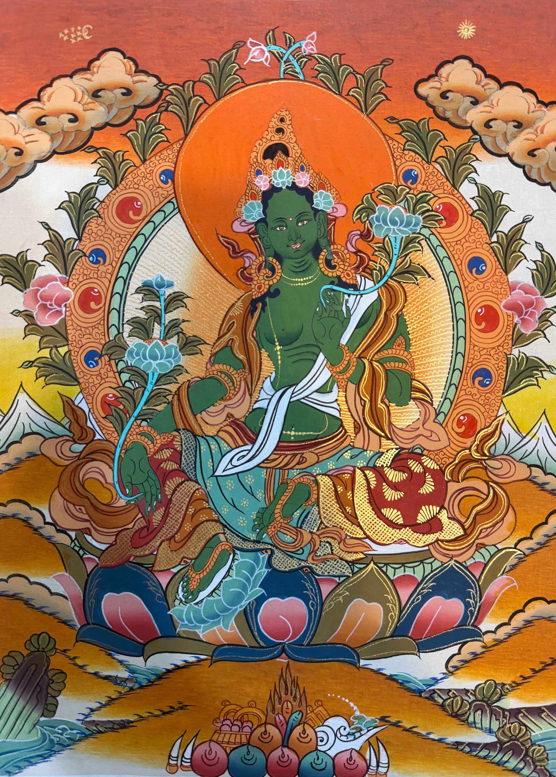 Green Tara thangka painting with seated green goddess, orange halo, ornate lotus base