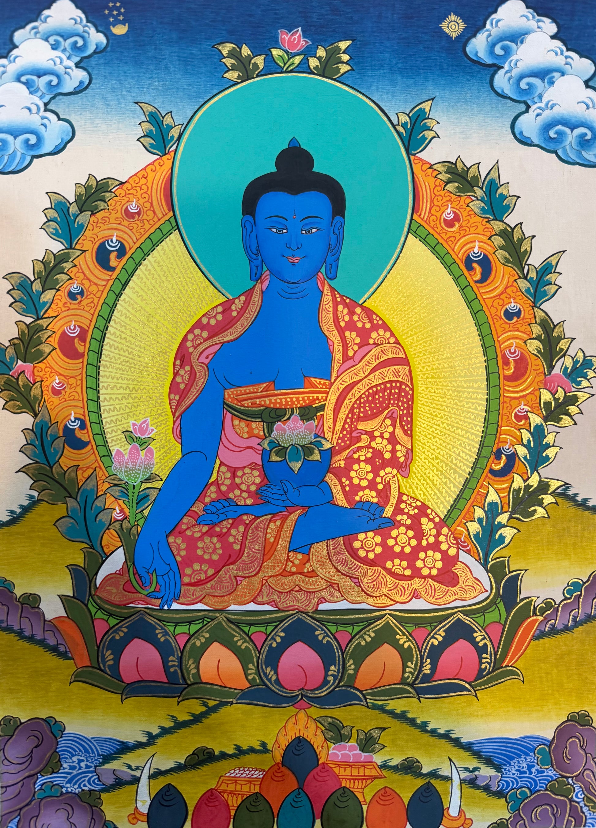 Medicine Buddha thangka painting of blue seated Buddha with halo and ornate robes