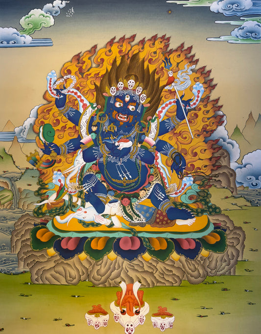 Mahakala thangka painting with six-armed deity, flaming halo, seated on ornate cushion