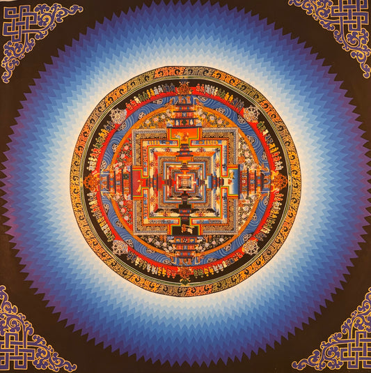 Kalachakra mandala thangka painting with an intricate orange, blue, and gold circular design