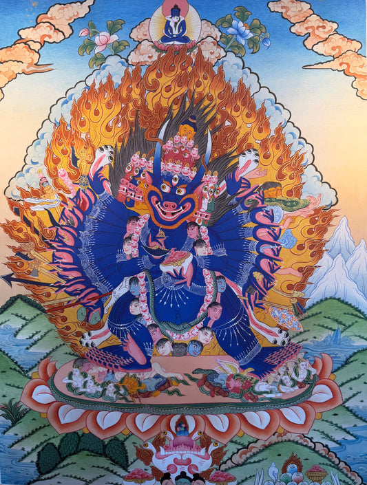 Framed thangka painting of Yamantaka deity with flaming mandala and blue multi-faced figure